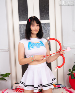 Virginica Playful Strip In White Top And Skirt With Angel Vibe