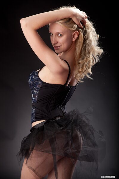 Katy Undressing On Studio Set In Black Corset And Sheer Skirt - photo 01