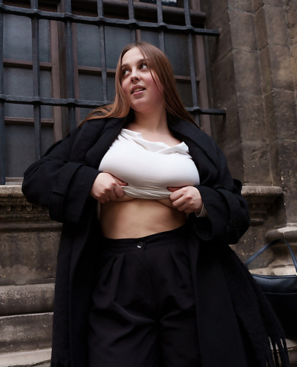 City Balcony Confidence With Adele Cotton In Black Outfit